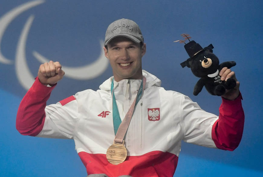 Igor Sikorski z medalem z Pyeongchang